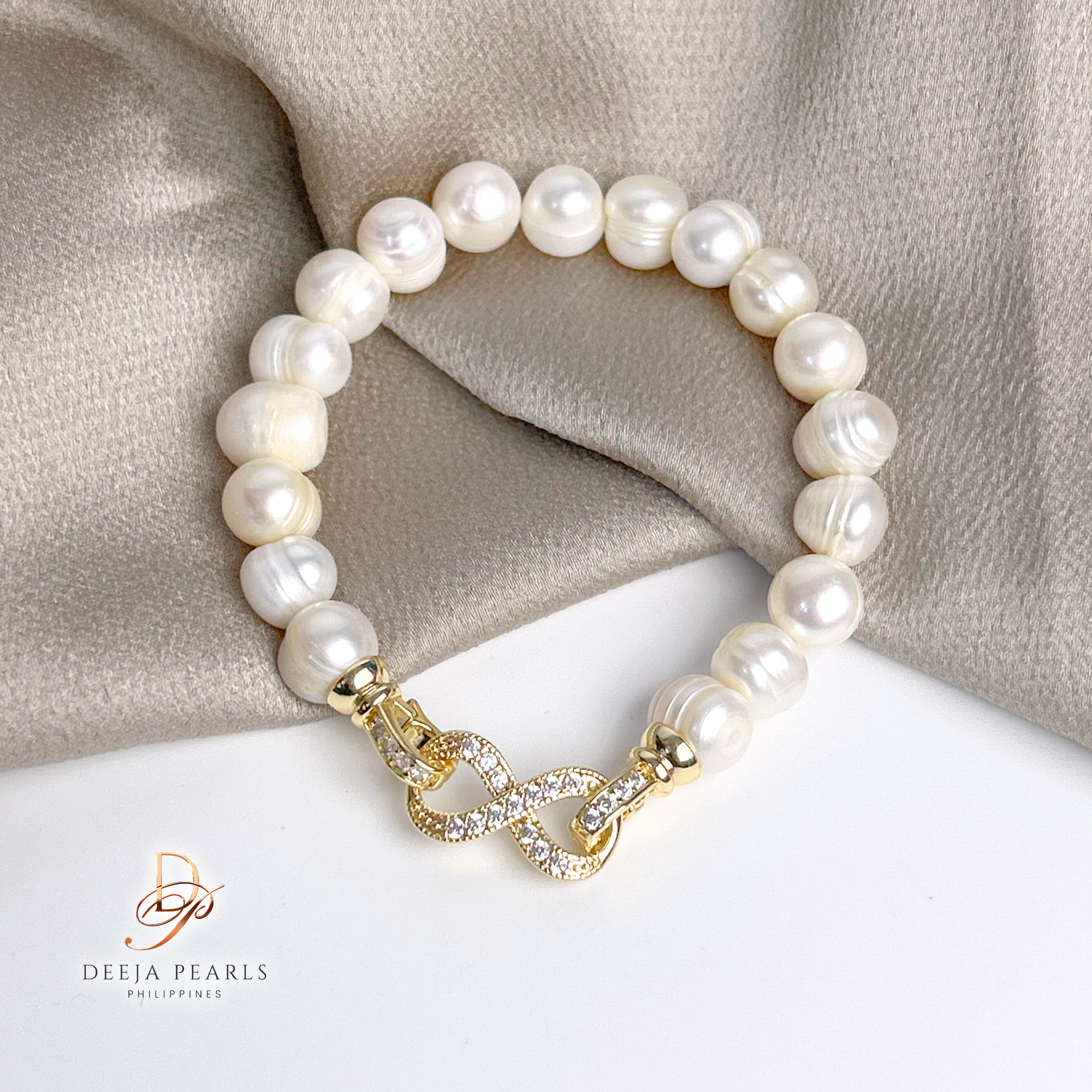 DPB115 • Freshwater Pearl Bracelet in Infinity Pendant Lock