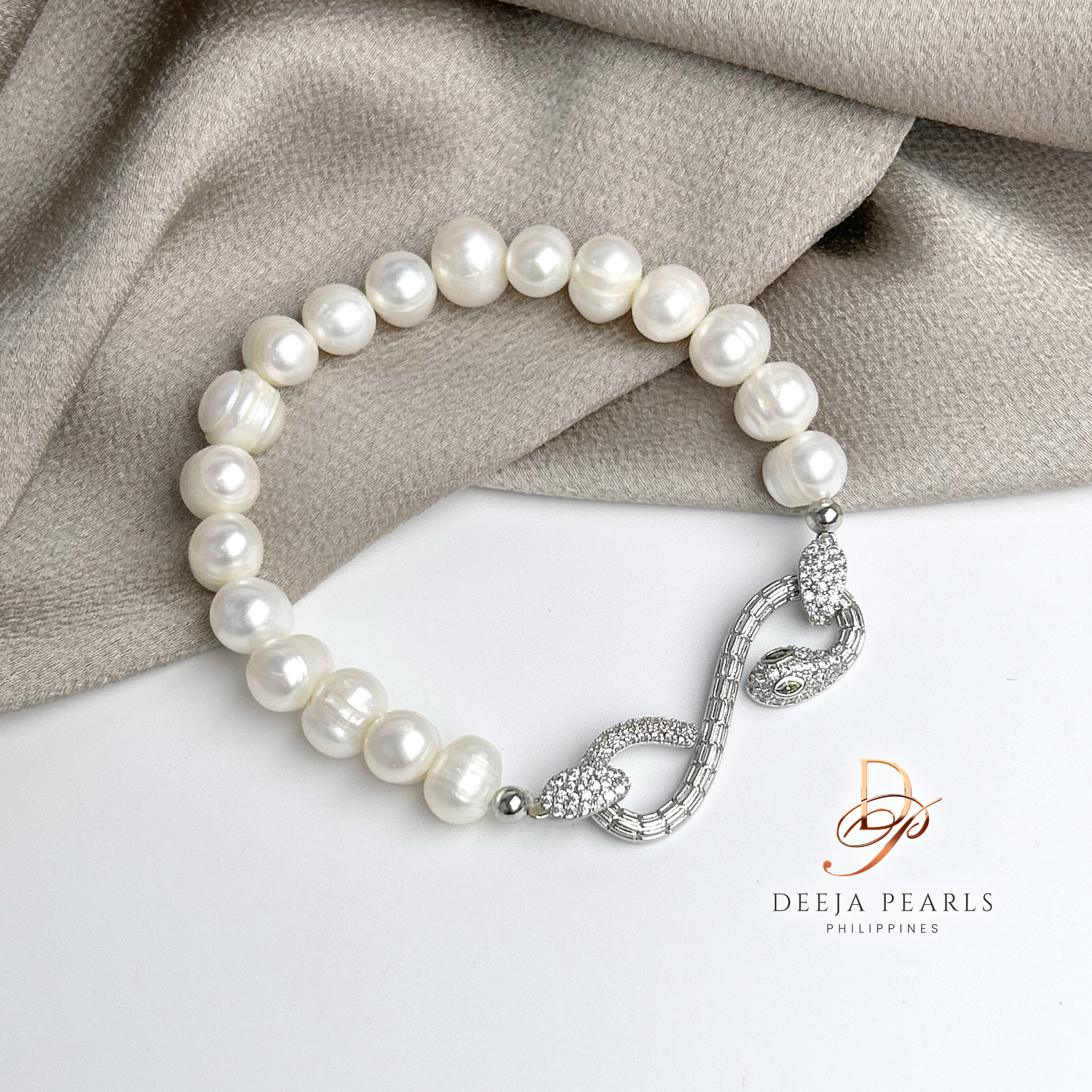 DPB112 • Freshwater Pearl Bracelet in Serpentine Pendant Lock