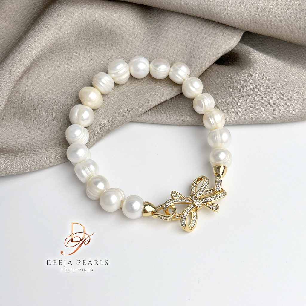 DPB113 • Freshwater Pearl Bracelet in Ribbon Pendant Lock