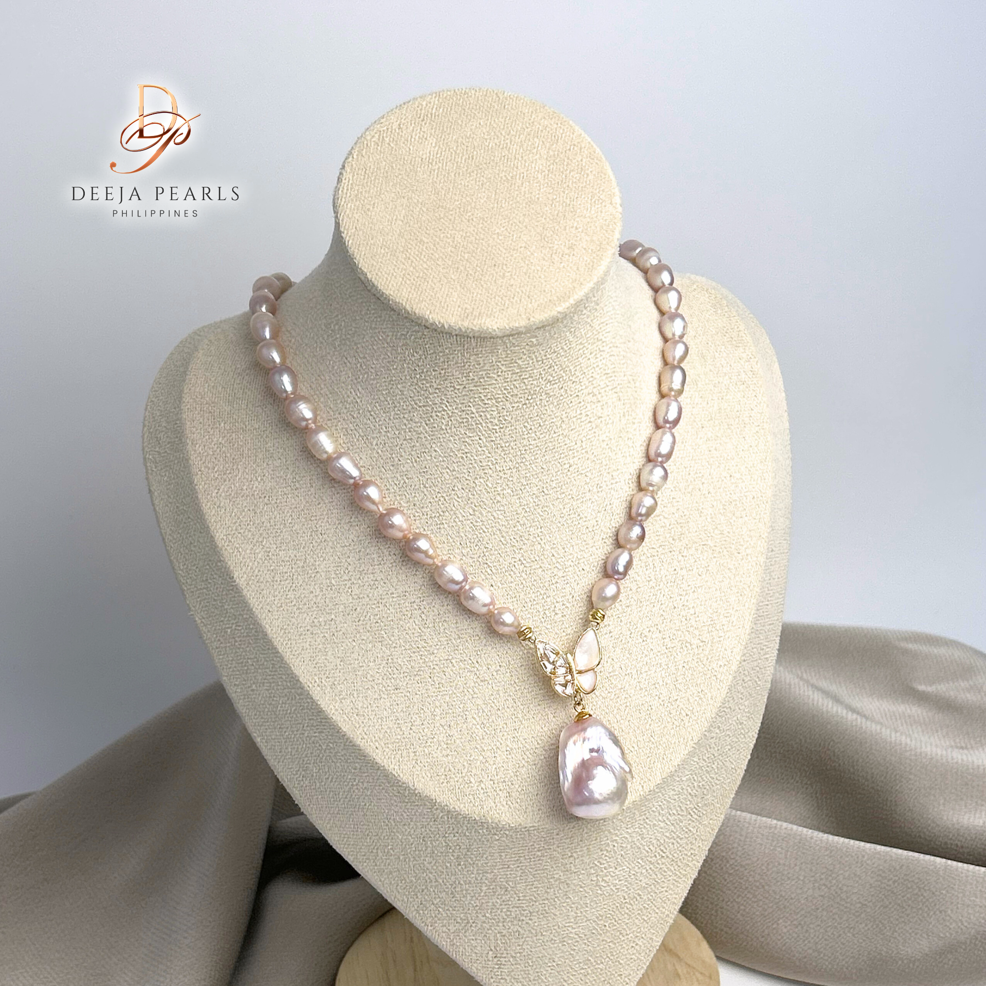 DPN117 • Freshwater Pearl Necklace with Baroque and Butterfly Pendant