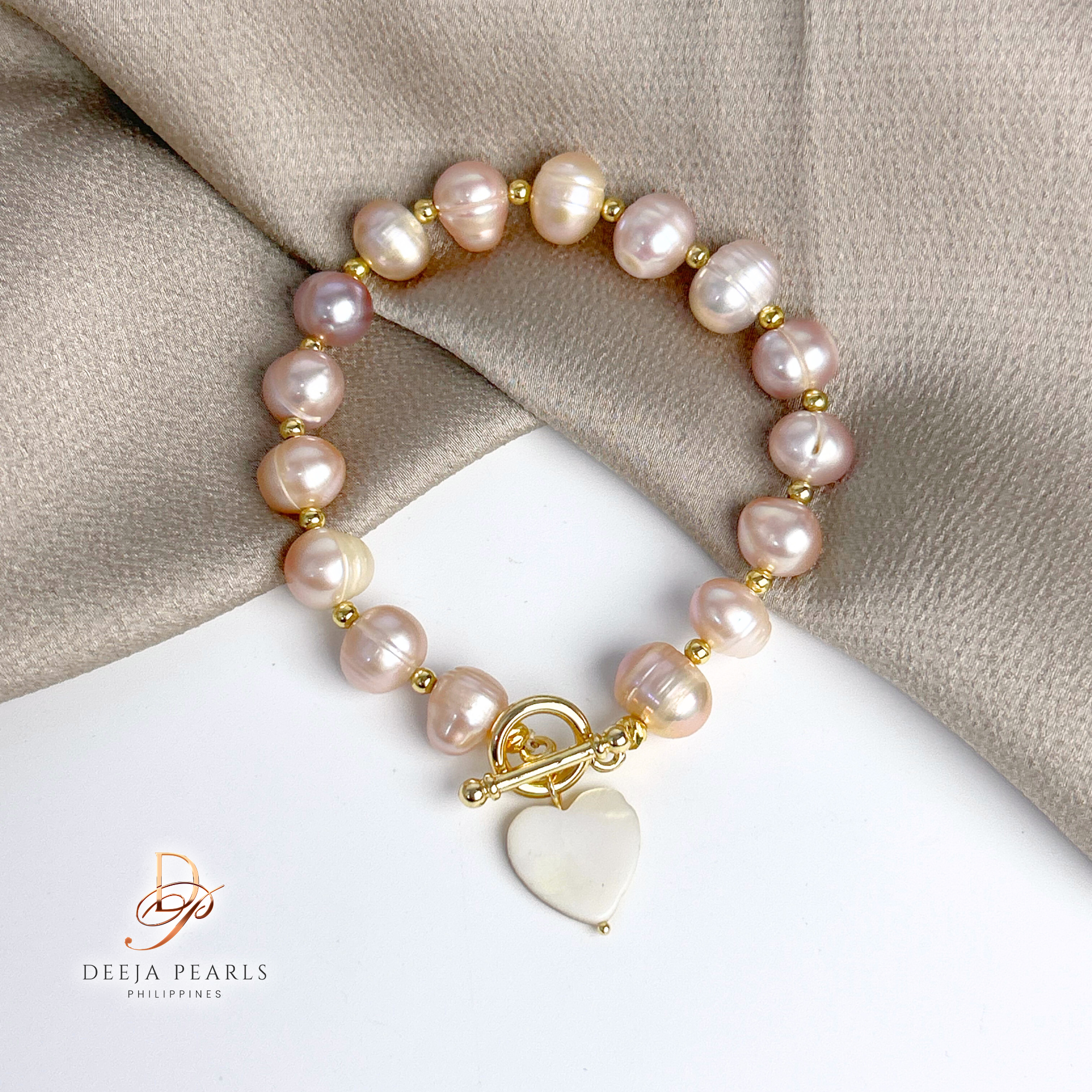 DPB130 • Freshwater Pearl Bracelet in Toggle Lock with Heart Shell