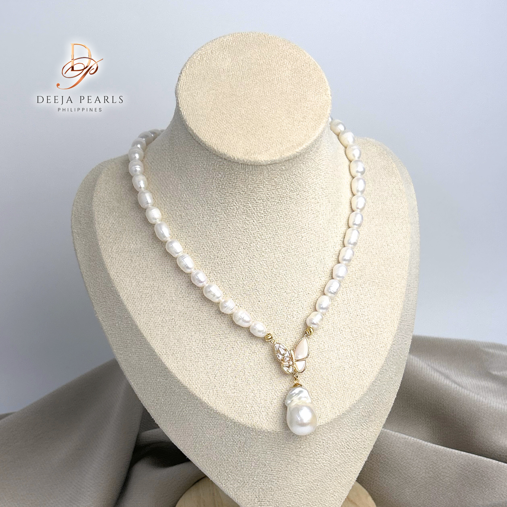 DPN117 • Freshwater Pearl Necklace with Baroque and Butterfly Pendant